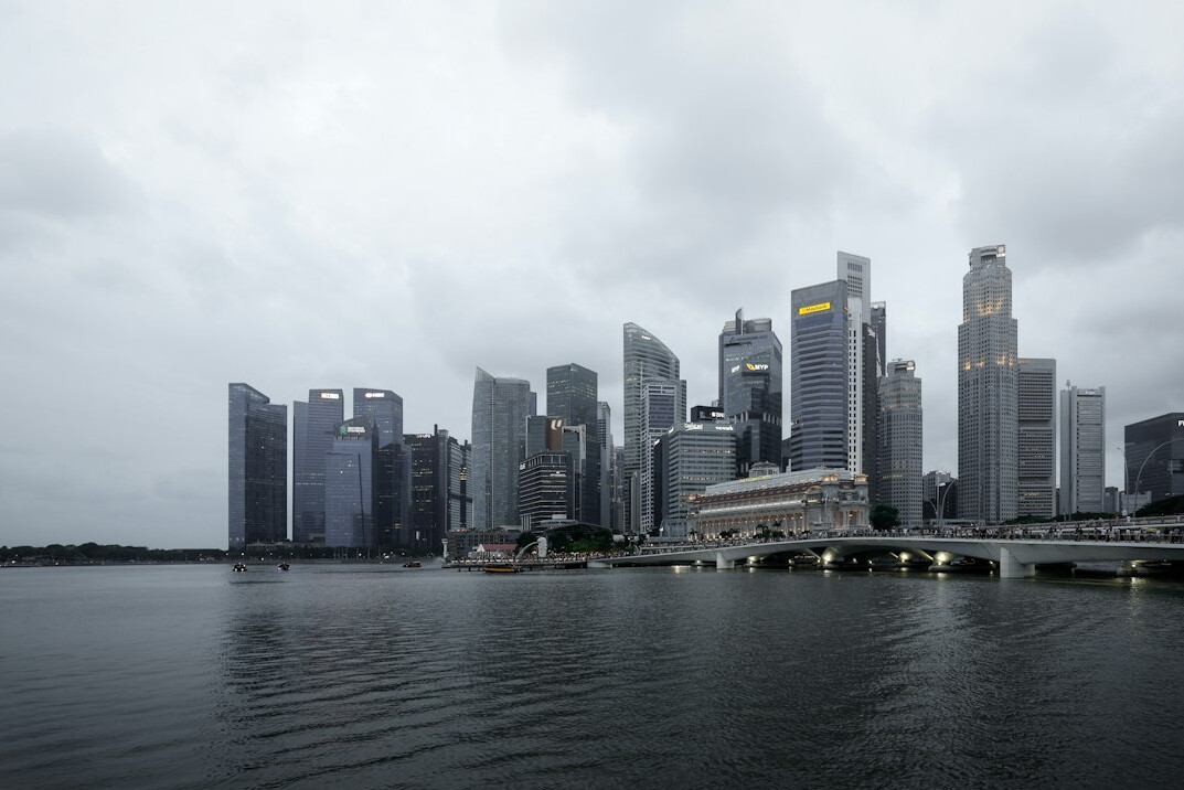Modern glass office building in Singapore's central business district skyline